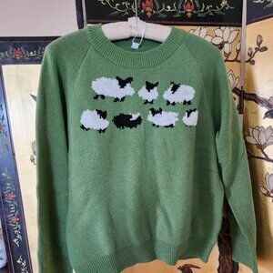 Crew neck sweater with sheep